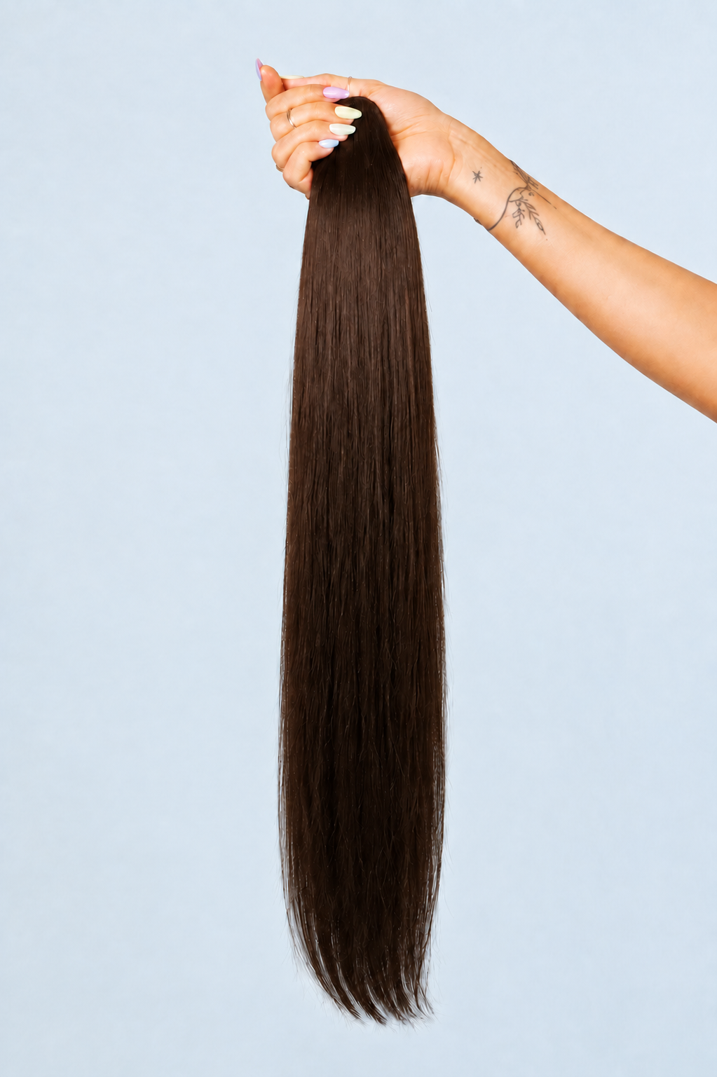 04 chocolate — genius weft, hand held, pale blue seamless